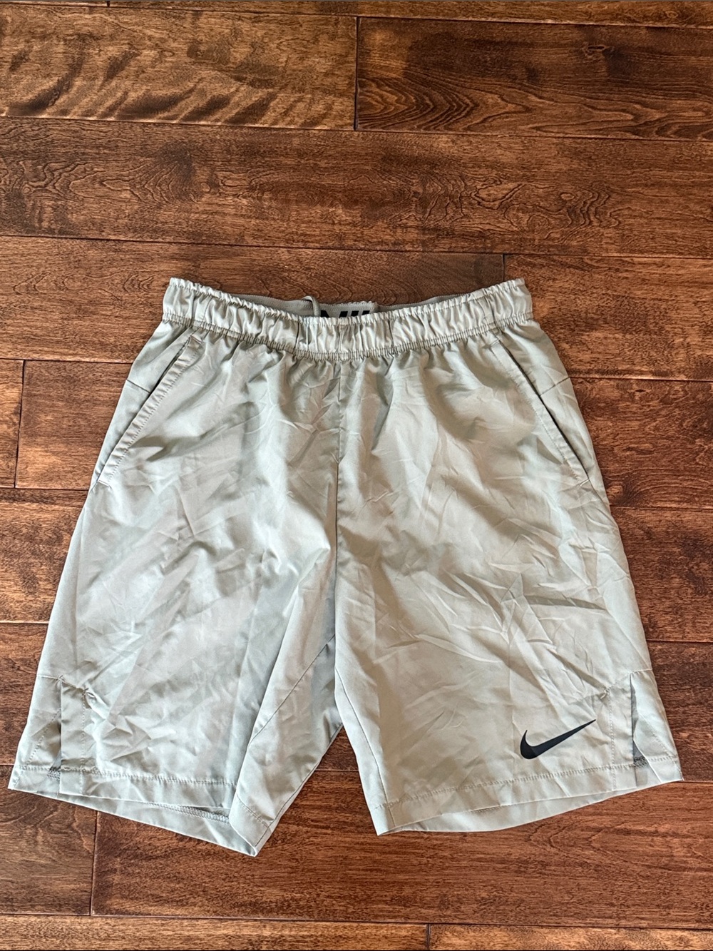 Nike Men’s Olive Green Athletic Shorts with Black Swoosh